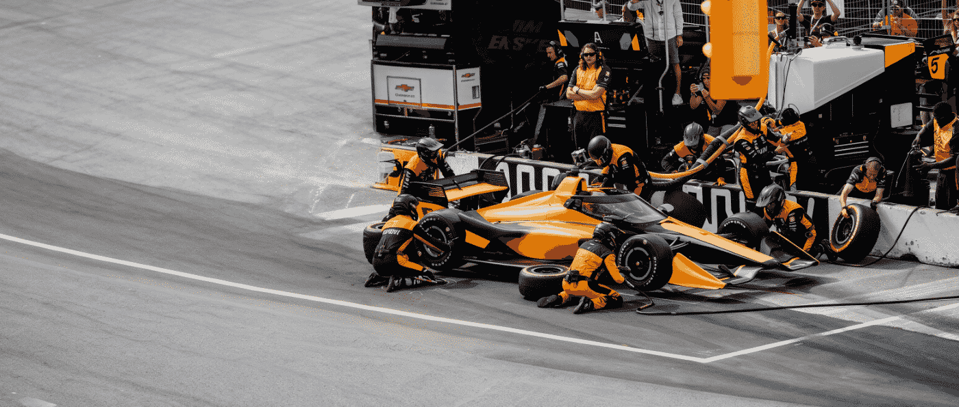 Open-wheel pit stop scene